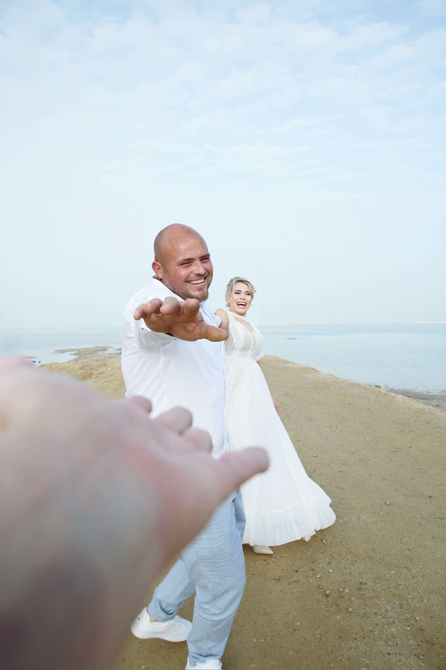 Joyful couple at the Dead Sea